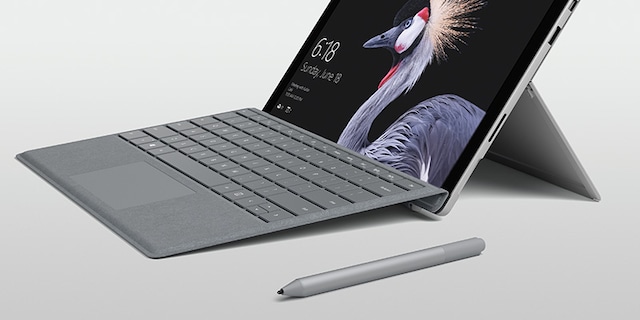 Penn ved siden av Surface Penn ved siden av Surface